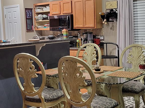 Sideway view of the kitchen table and how its far from the kitchen counter.