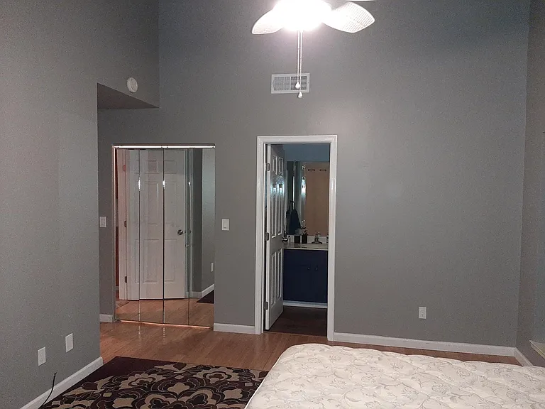 Master bedroom, view from slider/back yard