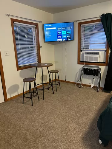Small table with stools and a Smart TV with Roku for streaming! (A/C during the summer) - 937 Columbia Ave