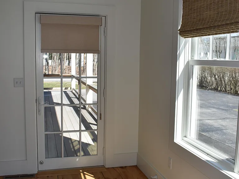 Second entrance for Unit 1, which is off the Living & Dining Room and access the wraparound porch.