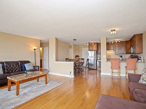 Living Room View to Kitchen, Breakfast & Entry