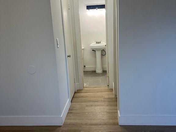 Hallway to bedroom and bathroom