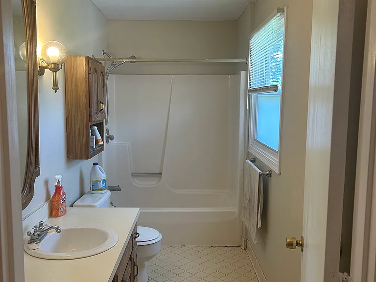 Bathroom off of kitchen/Bedroom