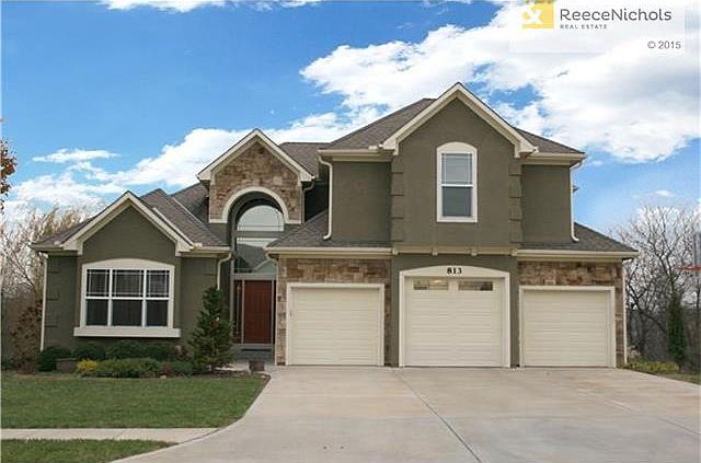 Stone and Stucco on front of home.