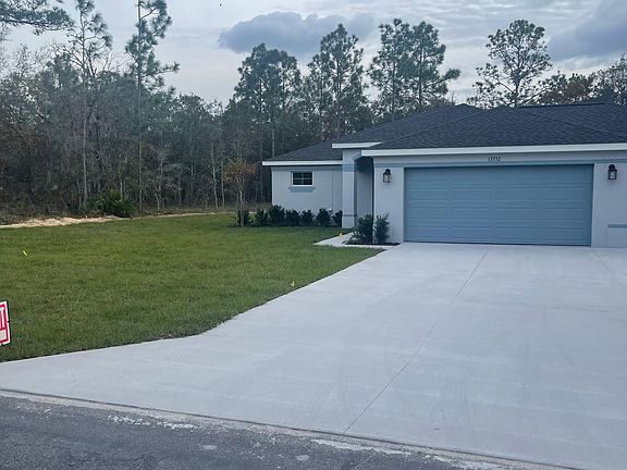 Brand New Home Front of home , 1/2 acres. Attractive two tone colors complete the exterior of the home.
Located on a quiet street in Royal Highlands .