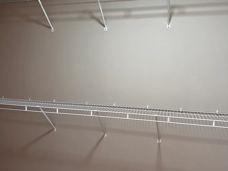 Walk in closet in the master bathroom