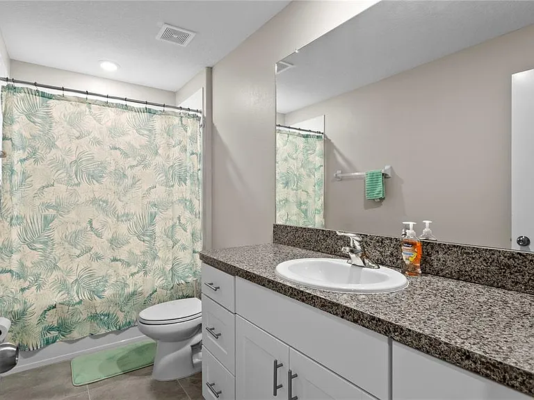 7109 Paradise Island Ct — Photo 36