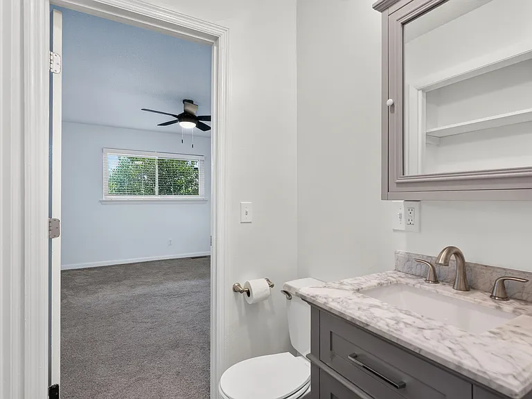 Half Bathroom between bedroom 1 and Kitchen