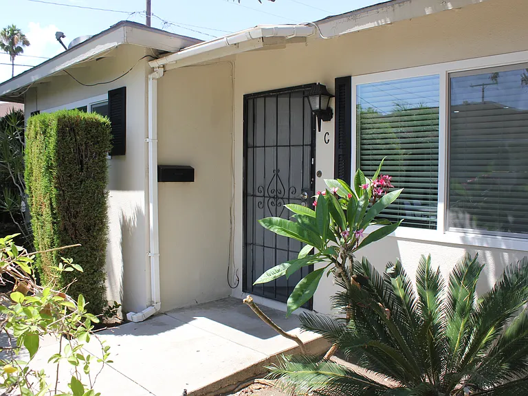 Screen doors front and back helps create breezy afternoon comfort.