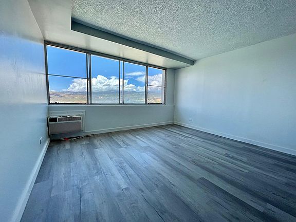 Freshly painted w/ new luxury vinyl flooring.