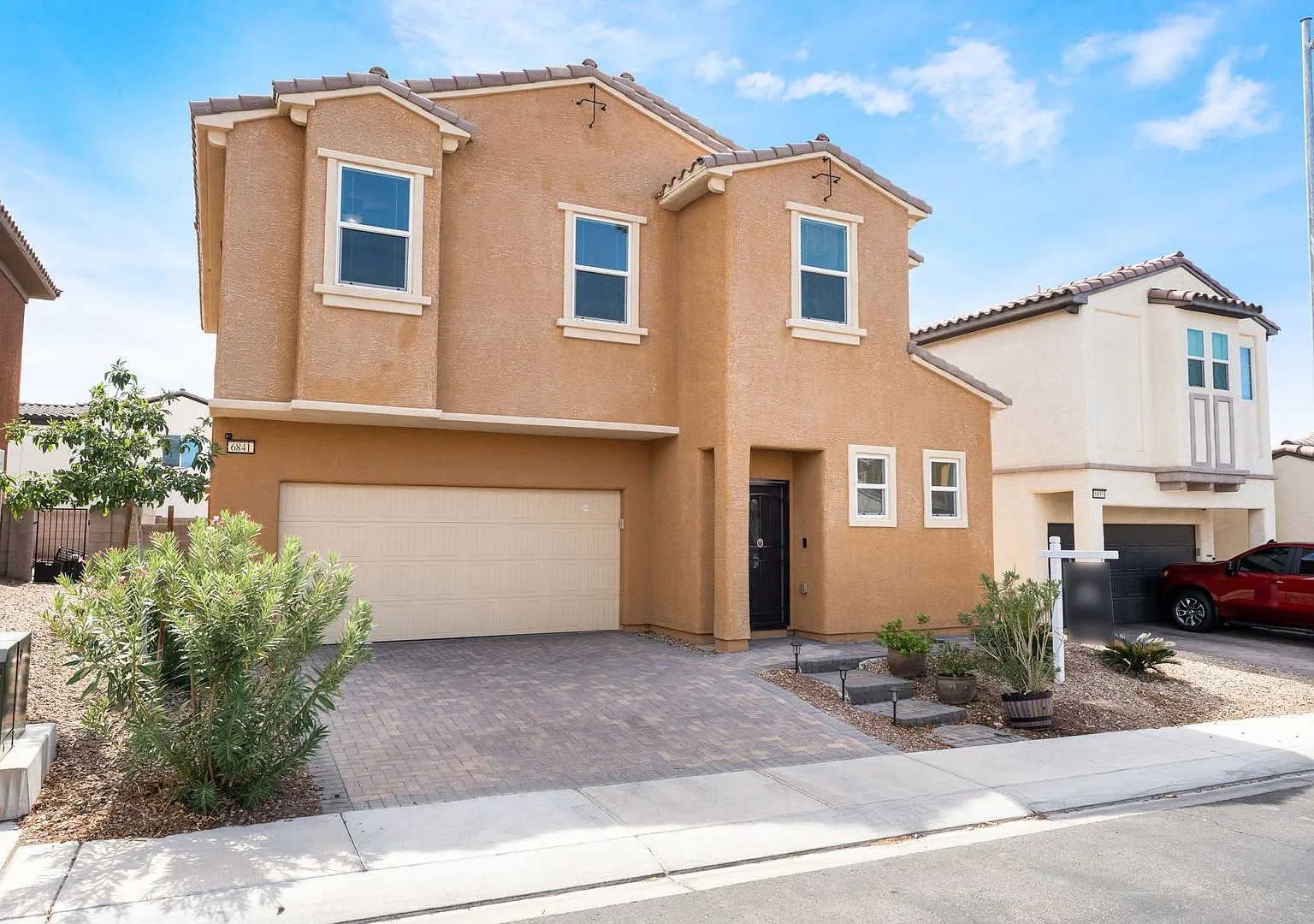 Welcome to this spacious 4-bedroom, 2.5-bathroom home at Sunrise Highlands Community! — Photo 2
