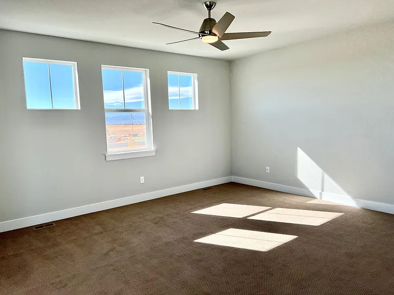 Spacious Master Bedroom with view of the park and mountains!