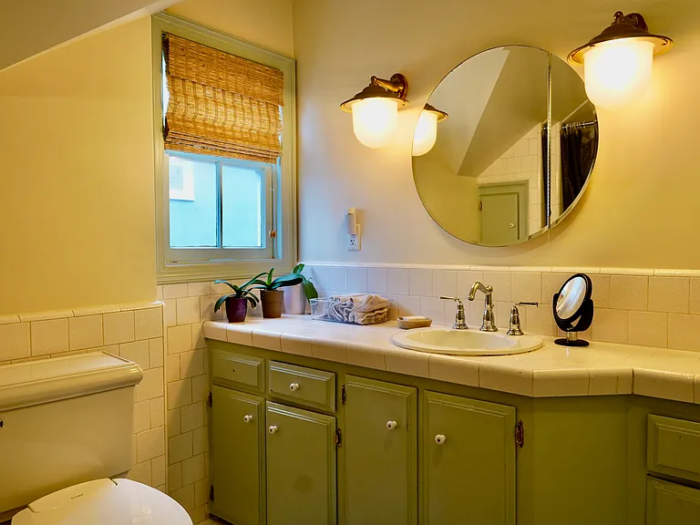 Upstairs bathroom with tub