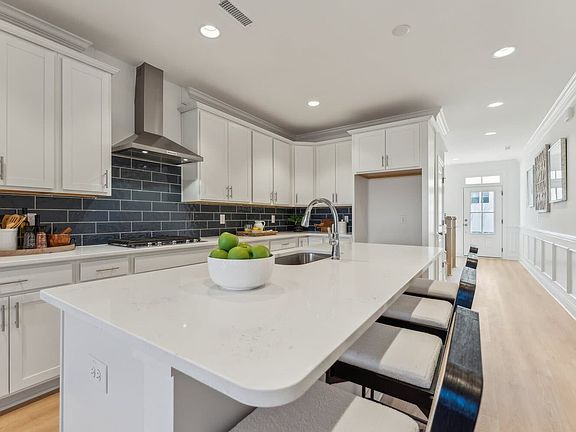 The kitchen of the Declan single family home by Brookfield Residential at Wendell Falls.