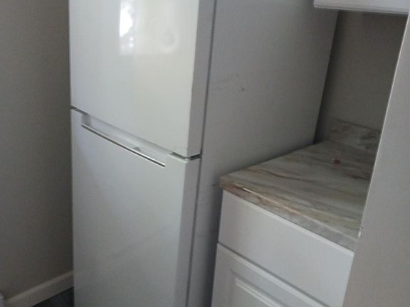 Small, newly renovated Kitchen. Apt. Size Fridge & Stove