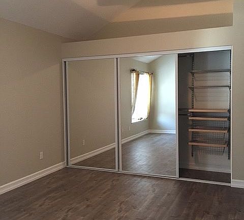 Bedroom closet w/ Elfa org.