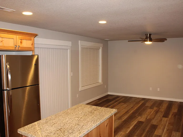 View of Kitchen, Nook and Great Room from Entryway