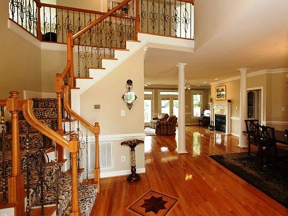 Foyer with open staircase.