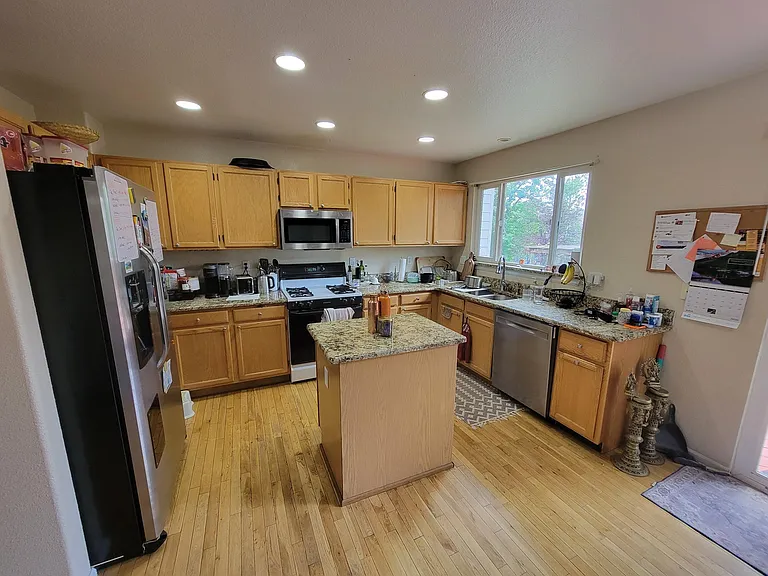 kitchen with wood floors and island