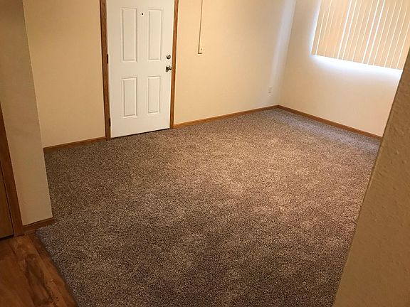 Large living room with ceiling fan