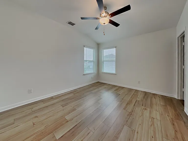 Brightly lit, spacious room wi