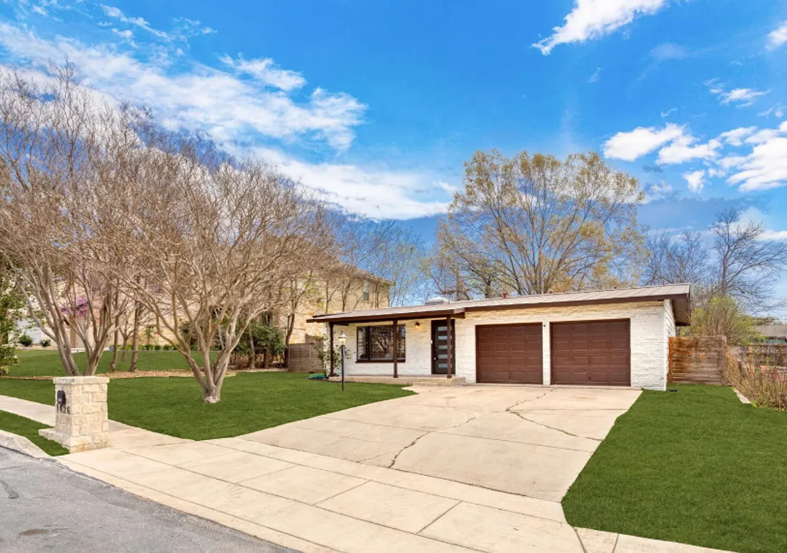 Charming 3-Bedroom Home with Sunroom and Spacious Backyard — Photo 1