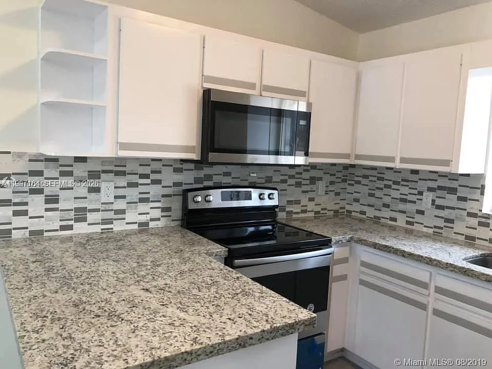 Building Photo - 2246 W 74th St #202-10