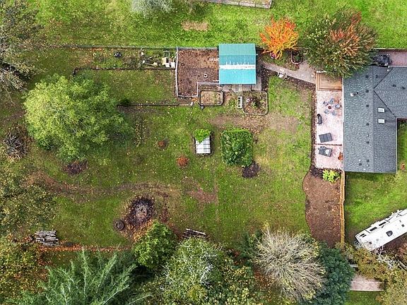 Large lot on just short of an acre of land. Bring all your toys! You have room to spread out here!