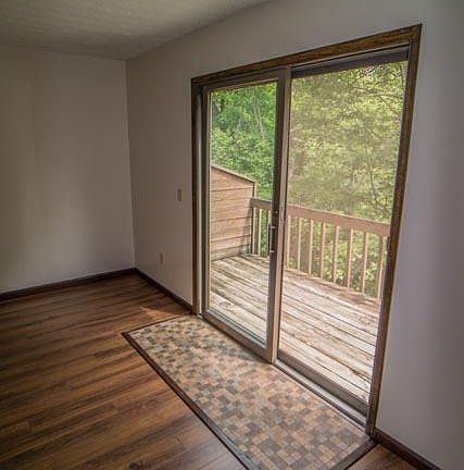 Living room with slider to balcony