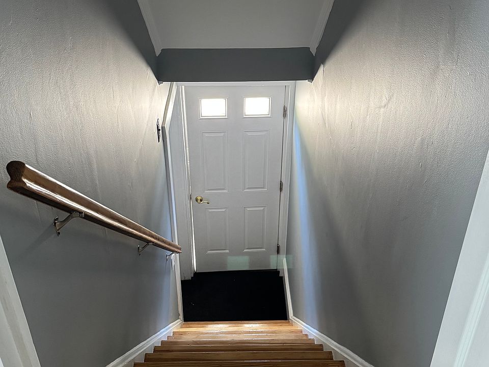 Hallway that leads to the upstairs apartment.