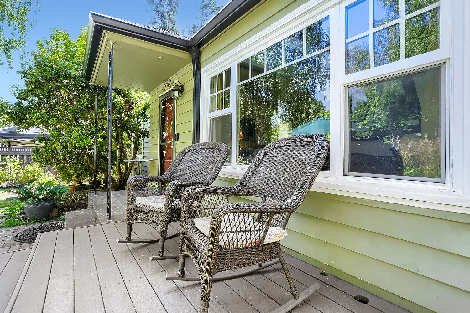 Front of home with relaxing deck