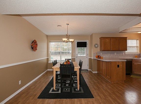 Eating area holds large dining table