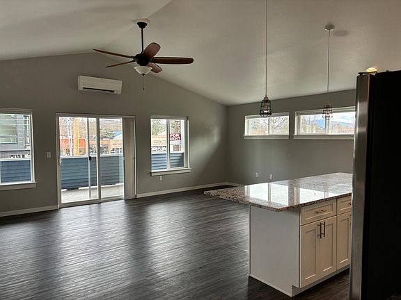 Living room is open and access to the deck