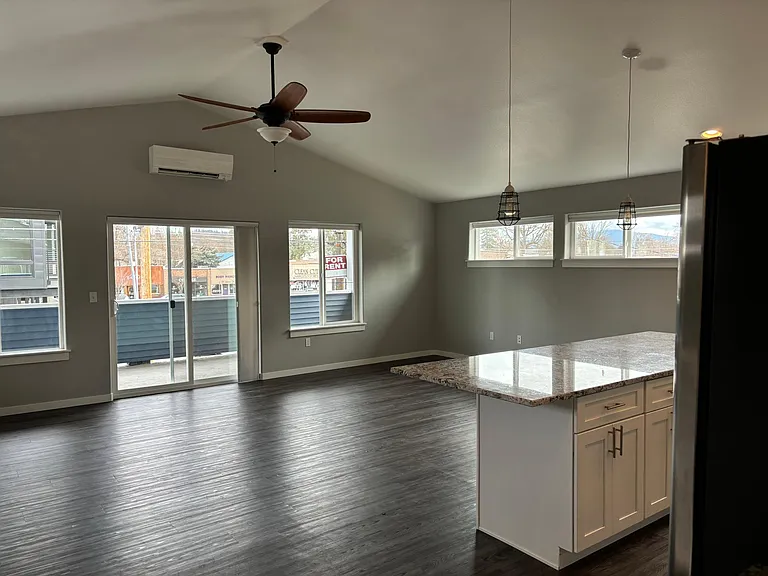 Living room is open and access to the deck