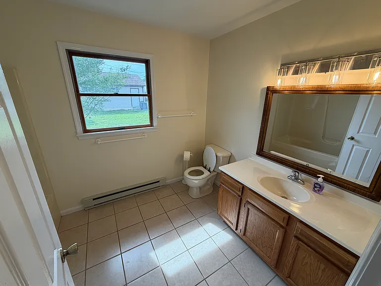 Huge full bath features lots of space and storage