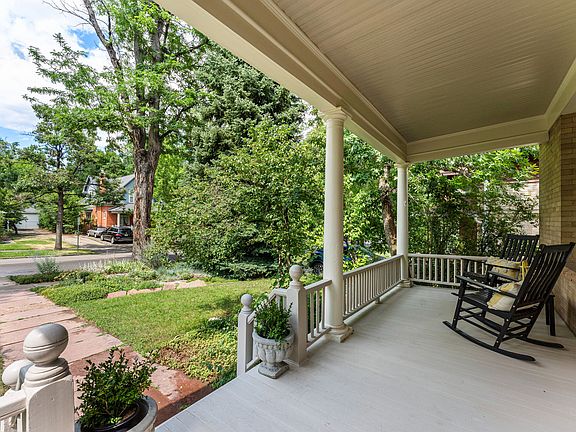 This gem features a covered front porch, perfect for relaxing and taking in the beautiful scenery!