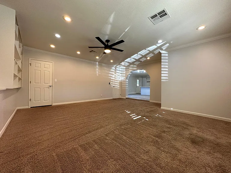 Large family room, storage closet & laundry room
