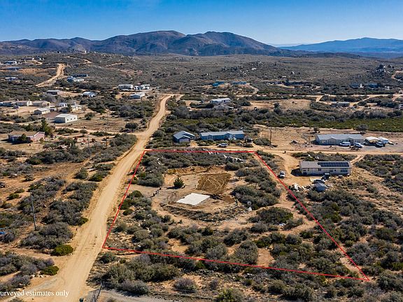 Arial views of Mountains.  Nice open space behind home!