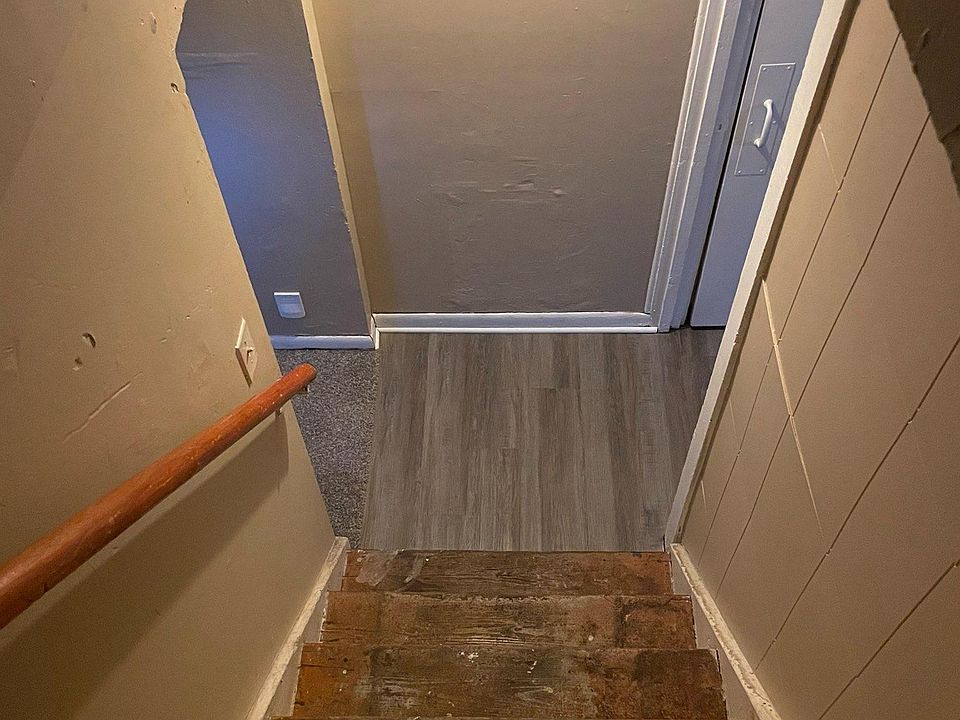 Stairs leading down to the apartment.