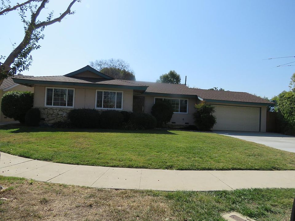 Front view of house with new driveway