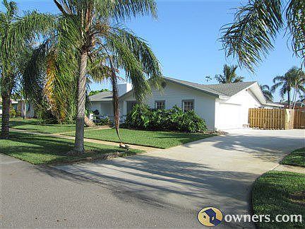 Front Yard with tree lined sidewalk