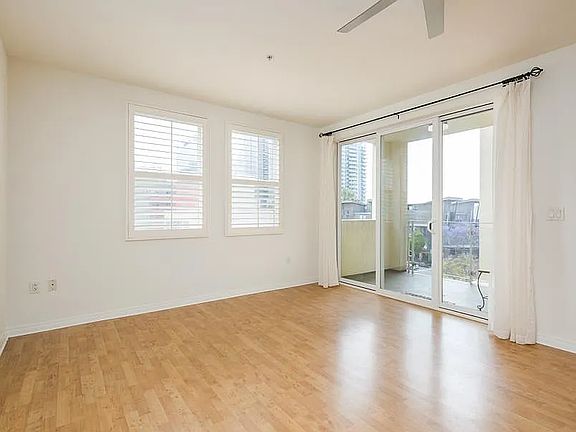 Glass balcony for table and chairs and extra storage space.