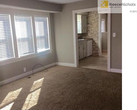 Dining area showing windows & blinds.