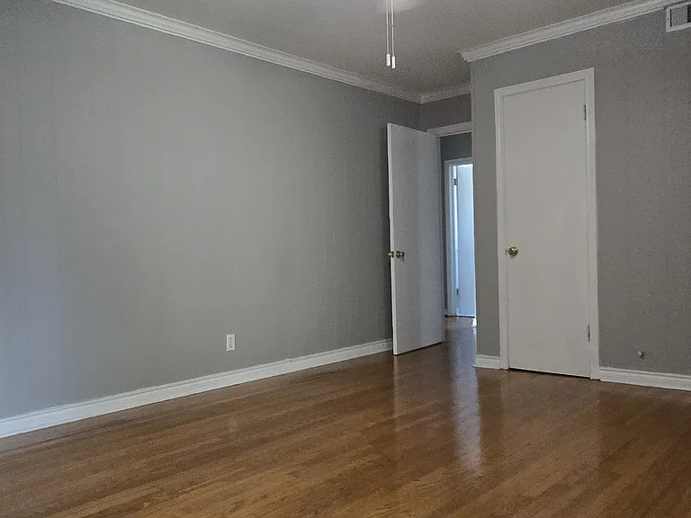 Another angle of that back bedroom (or den) with the large sliding glass door