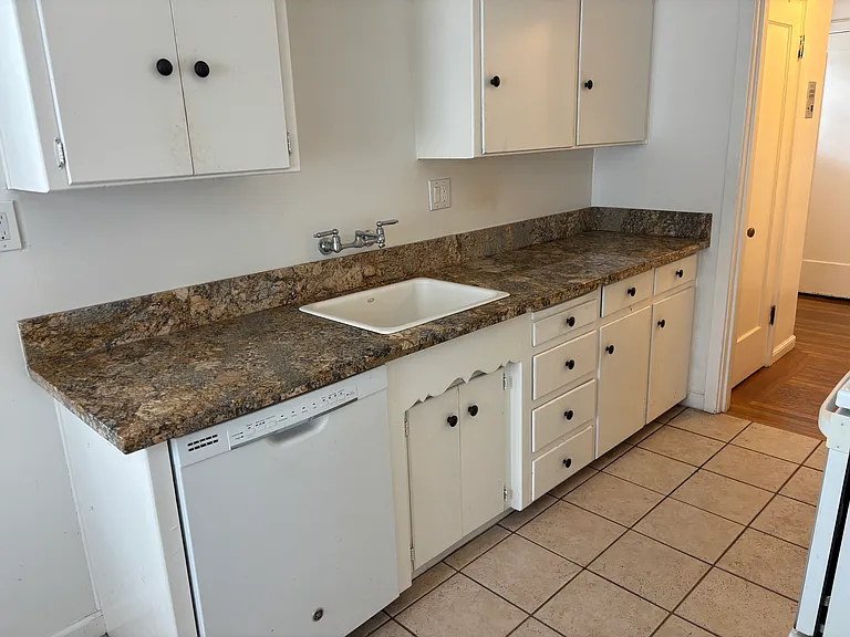 Kitchen has dishwasher and garbage disposal