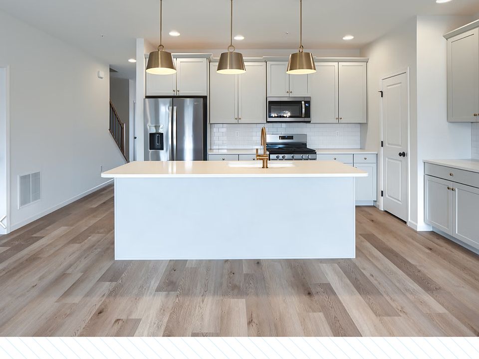 Spacious Kitchen with Upgraded Counter Tops, Refrigerator, Stove, Microwave and Cabinets