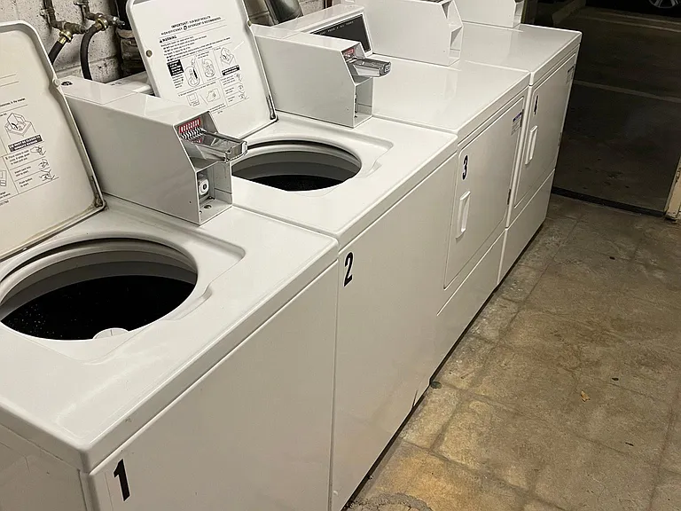 Onsite laundry room in gaged garage
