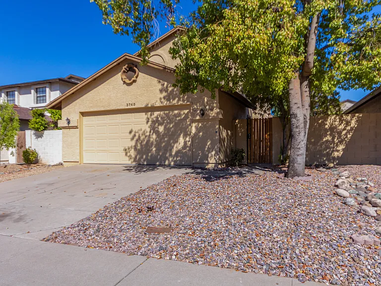 2 Car Garage + Privacy Gate to Get to Front Door.