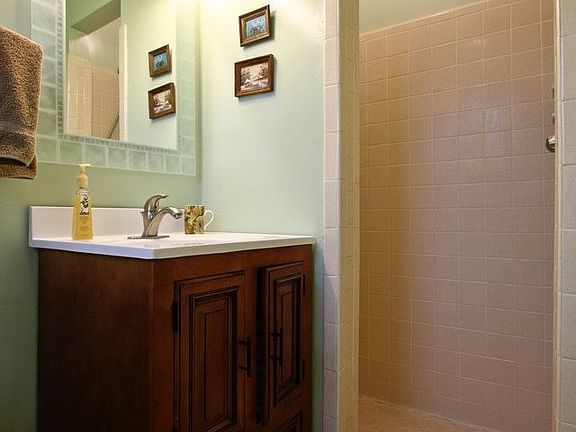 Master bath with tile and walk-in shower