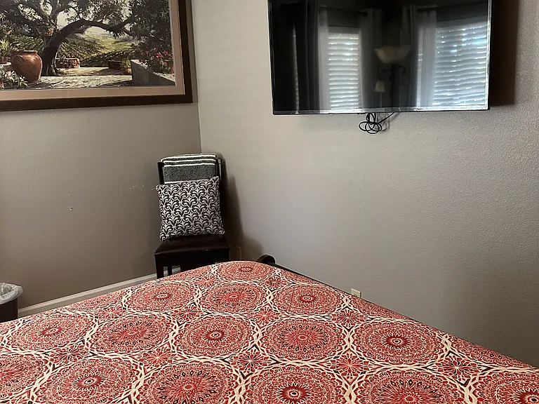 there is a desk (now under the wall art) to complete the room